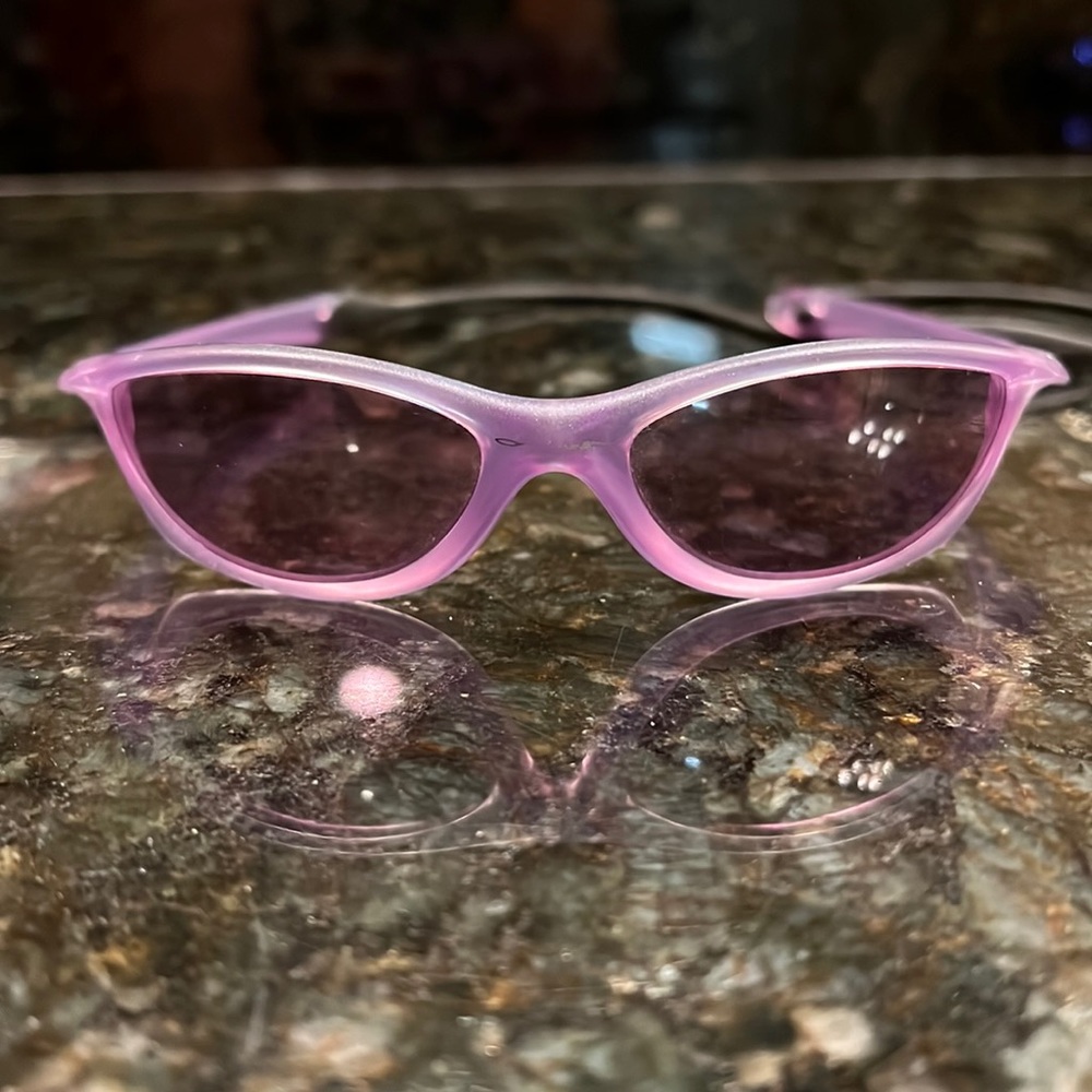Oakley sunglasses for baby. With rubber neck cord lilac color